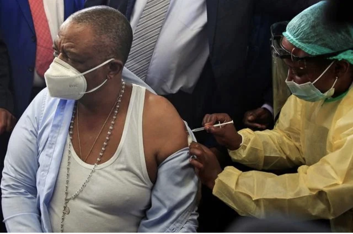 Zimbabwean Vice-President and Health Minister Constantino Chiwenga receives a coronavirus disease (COVID-19) vaccination in Harare, Zimbabwe, February 18, 2021.