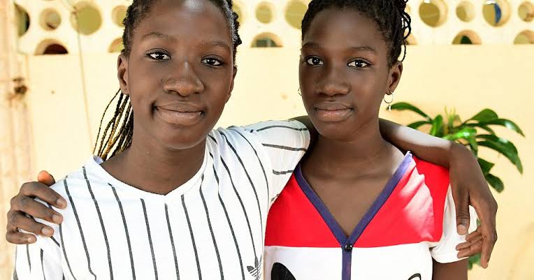 13 year old Senegalese twin girls graduate high school with very  impressive scores